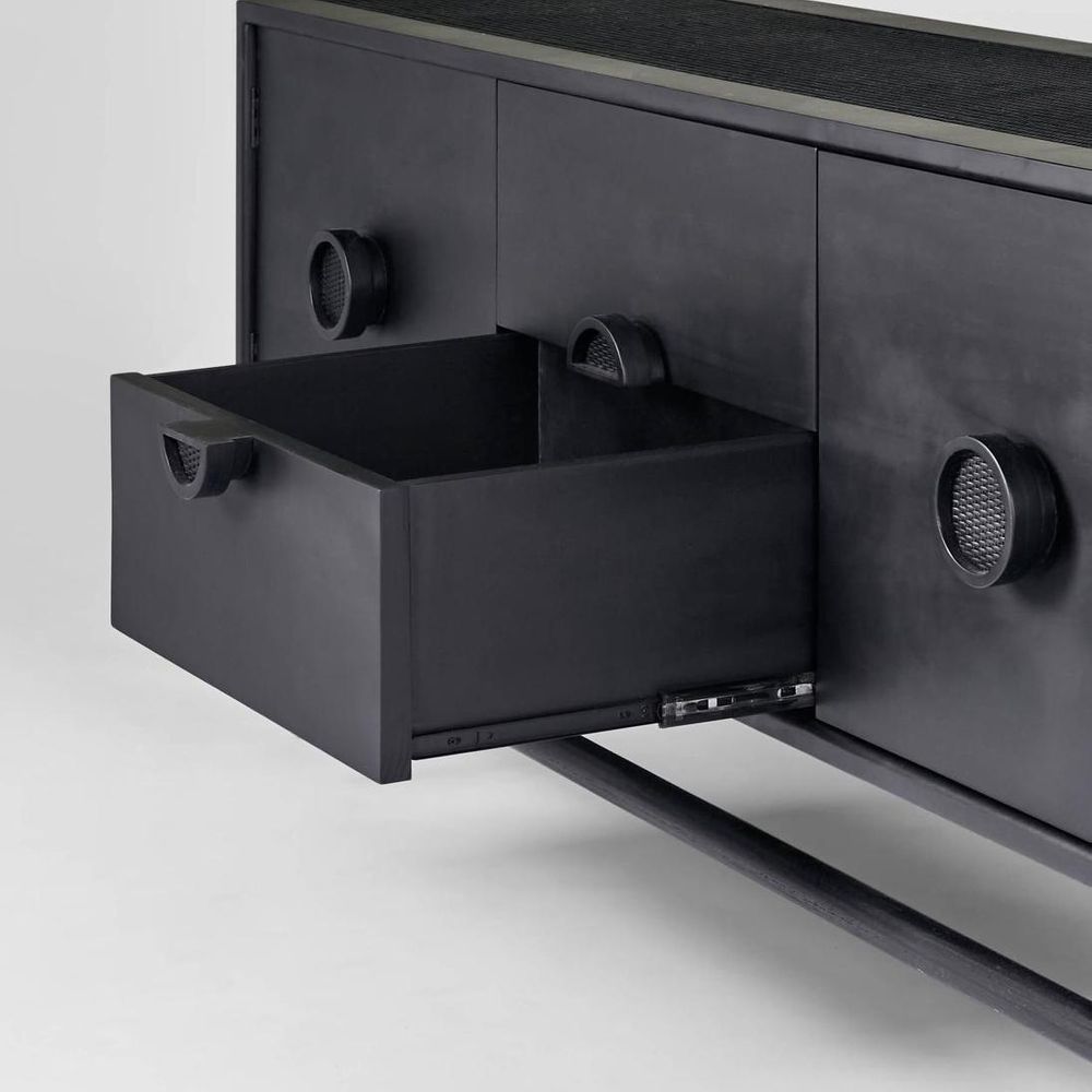 Black cabinet with open drawer on a white background