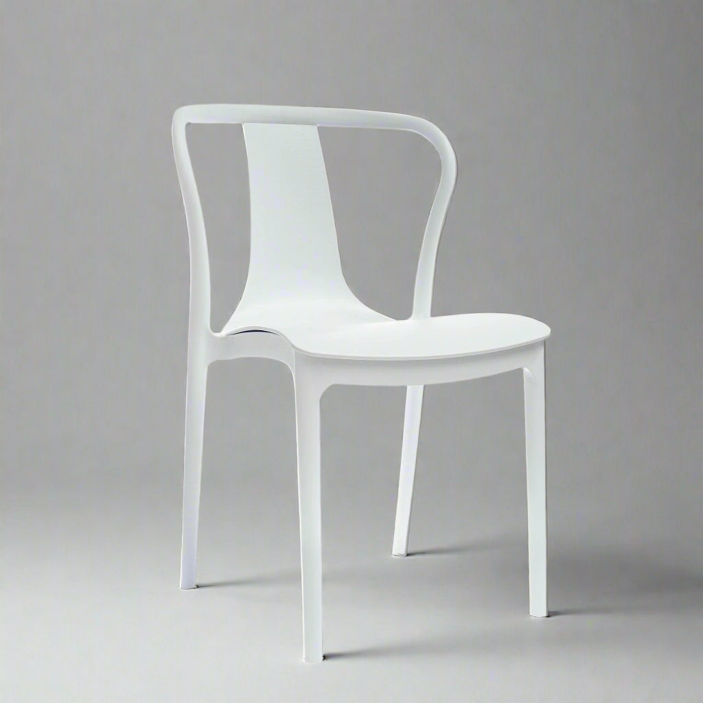White chair with armrests on a grey background
